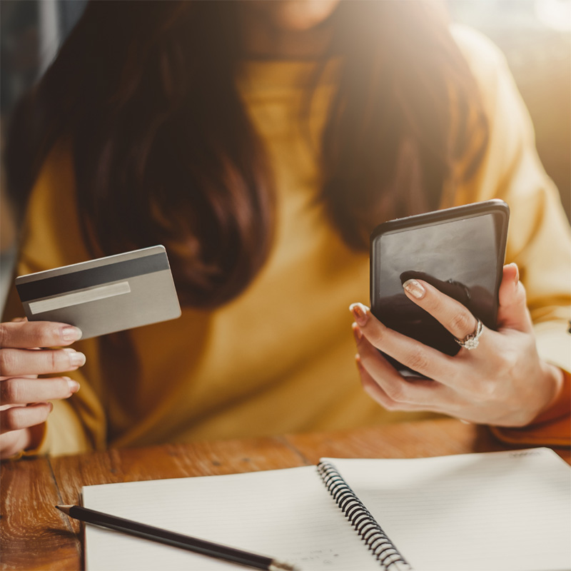 A woman shopping online with her cellphone