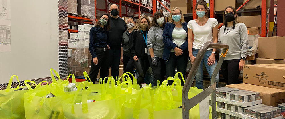 The Tree of Life team with food drive donations