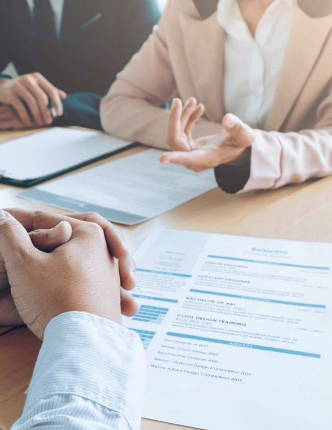 People discussing a resume during an interview