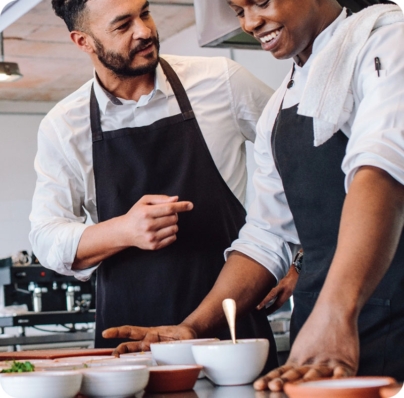 Two chefs in a kitchen
